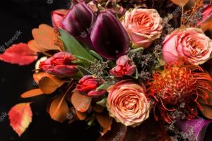 colorful-fall-bouquet-autumn-composition-roses-tulips-dry-leaves-herbs-closeup-flower-shop-florist-design-concept_116547-1098